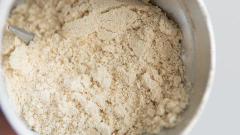 A close-up of finely ground lion's mane mushroom powder, ideal for use in supplements, smoothies, or cooking for its potential health benefits.